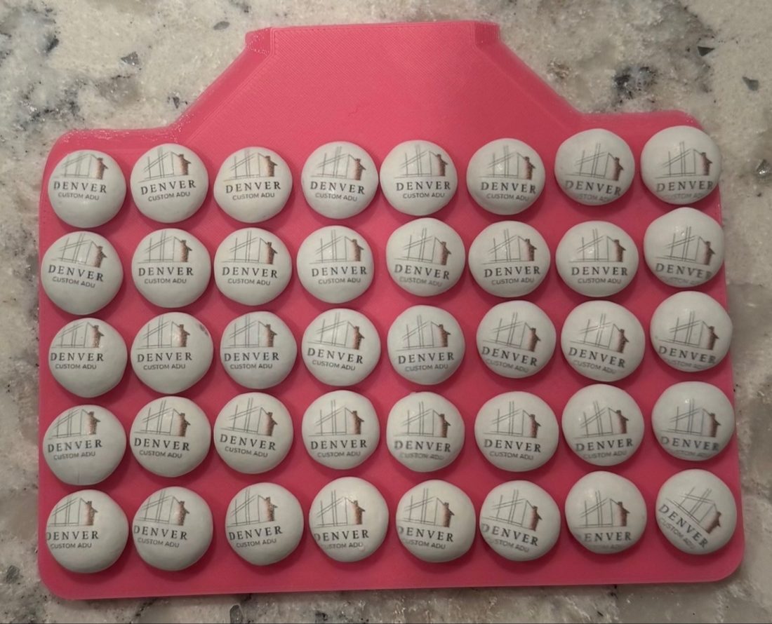 Tray of bite-size logo cookies