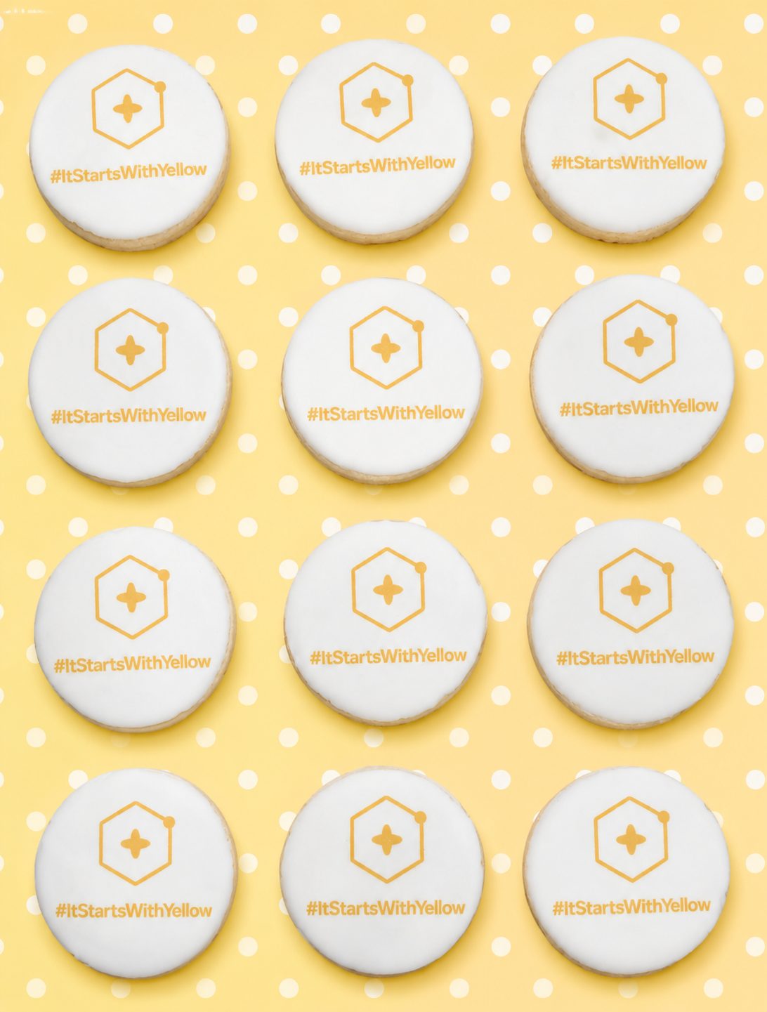 Branded hashtag campaign cookies on yellow polka dots